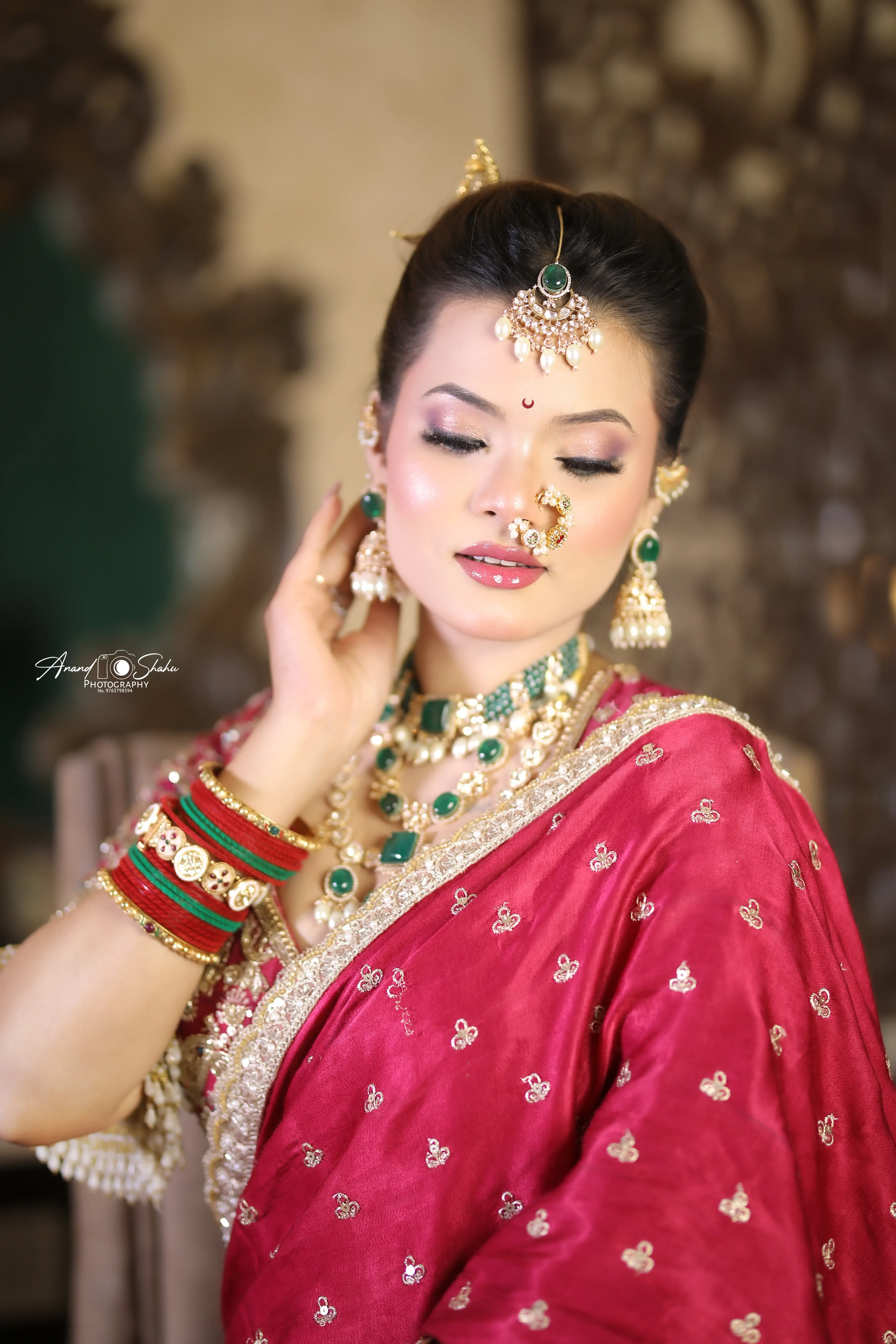 Traditional Maharashtrian bride makeup with jewelry at 7 Mirrors Salon Nagpur