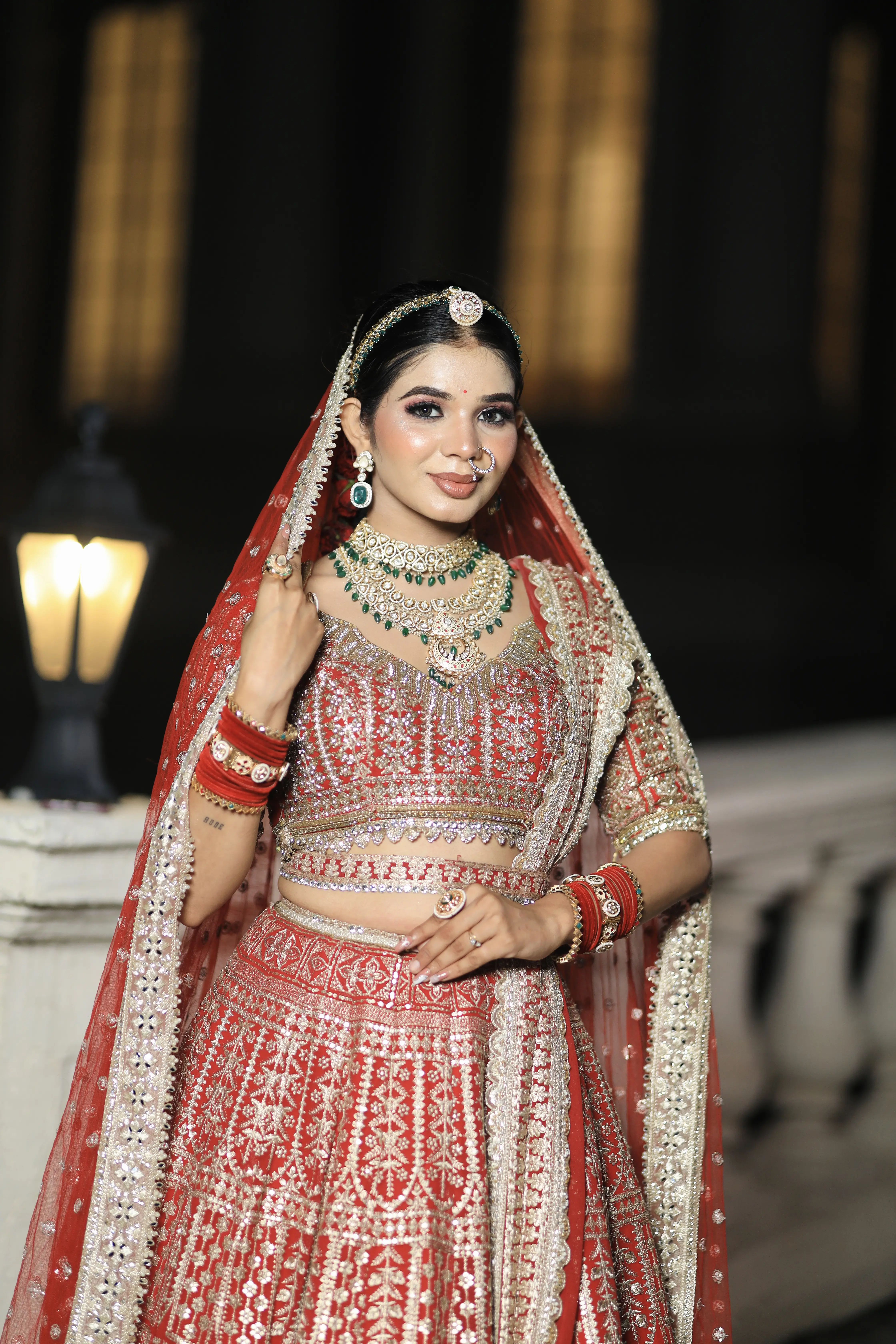 Bridal makeup for wedding ceremony with gold jewelry at 7 Mirrors Salon Nagpur